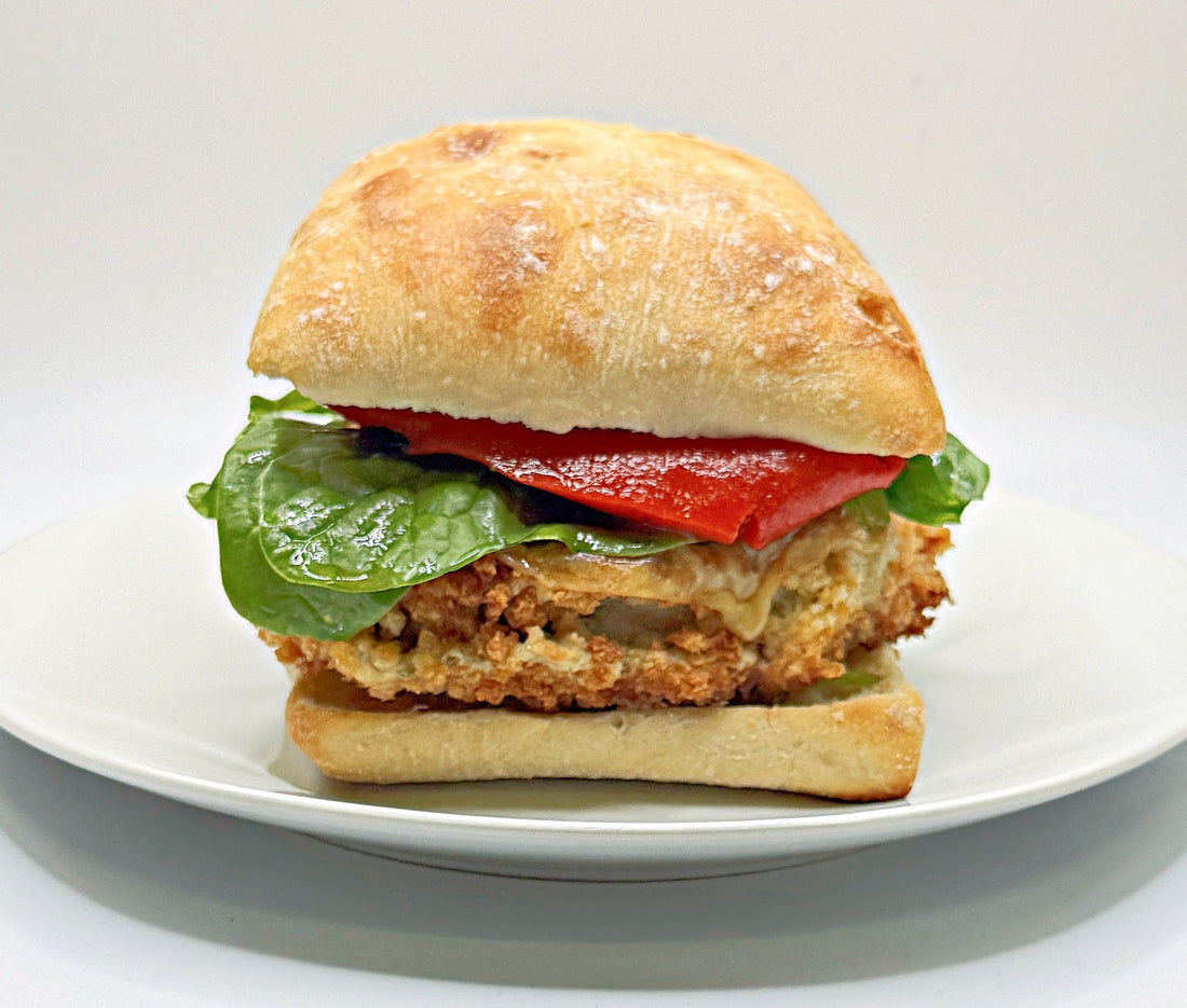 Fried Eggplant Sandwich with Roasted Red Peppers, Greens, & Basil Mayo