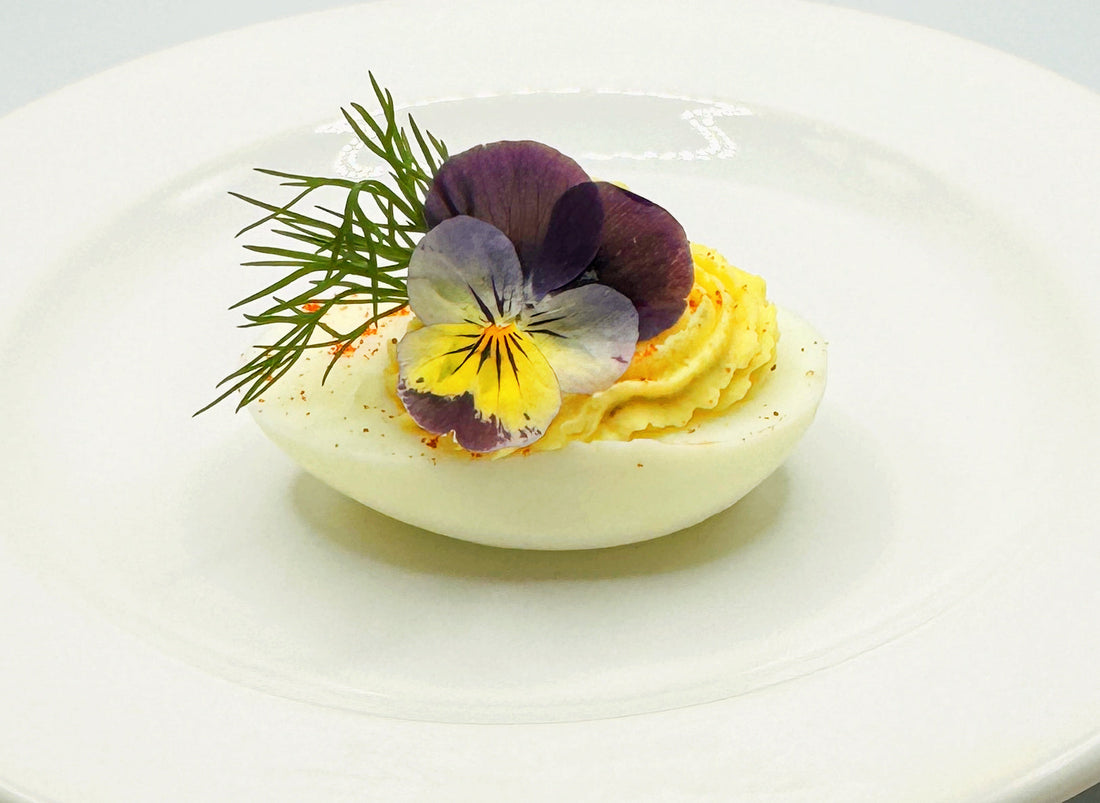 Traditional Deviled Egg with Dill and a Pansy